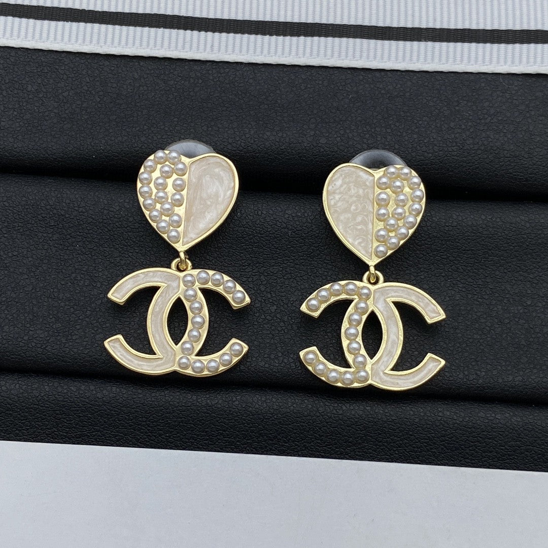 Single pearl earrings