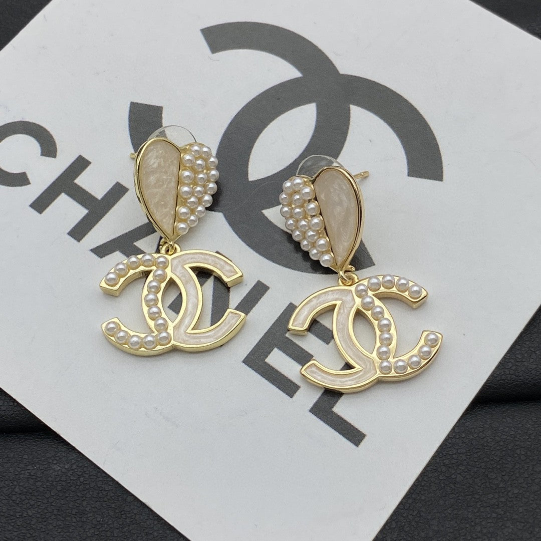 Single pearl earrings