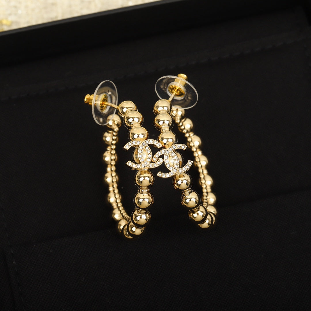 Golden bead double c pearl earrings
