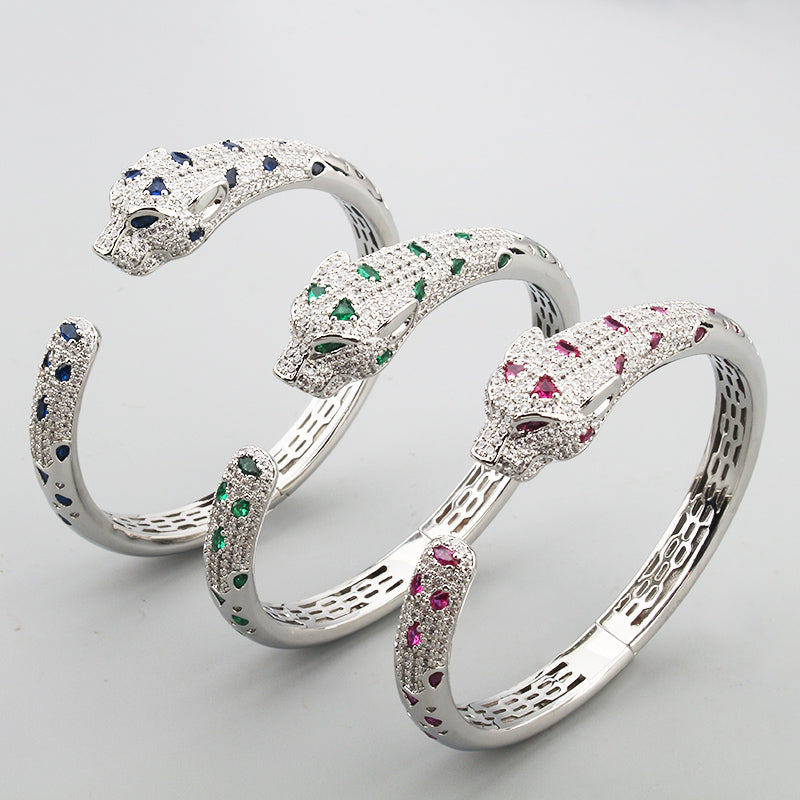 Colored diamond white gold bangle