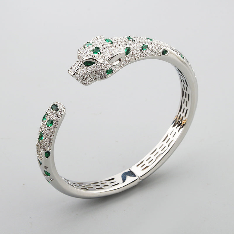 Colored diamond white gold bangle