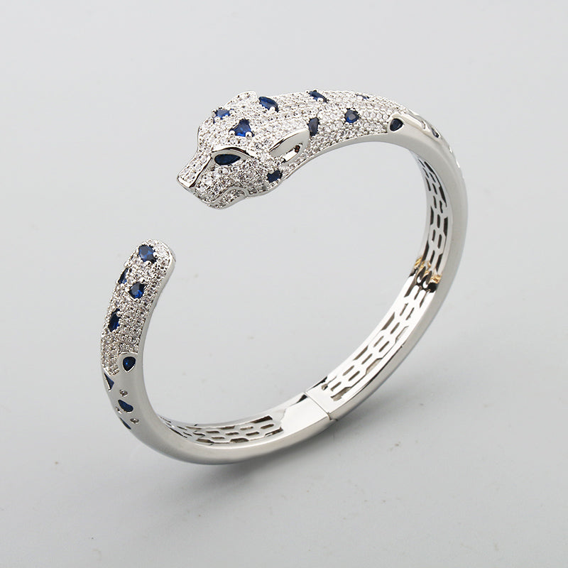 Colored diamond white gold bangle