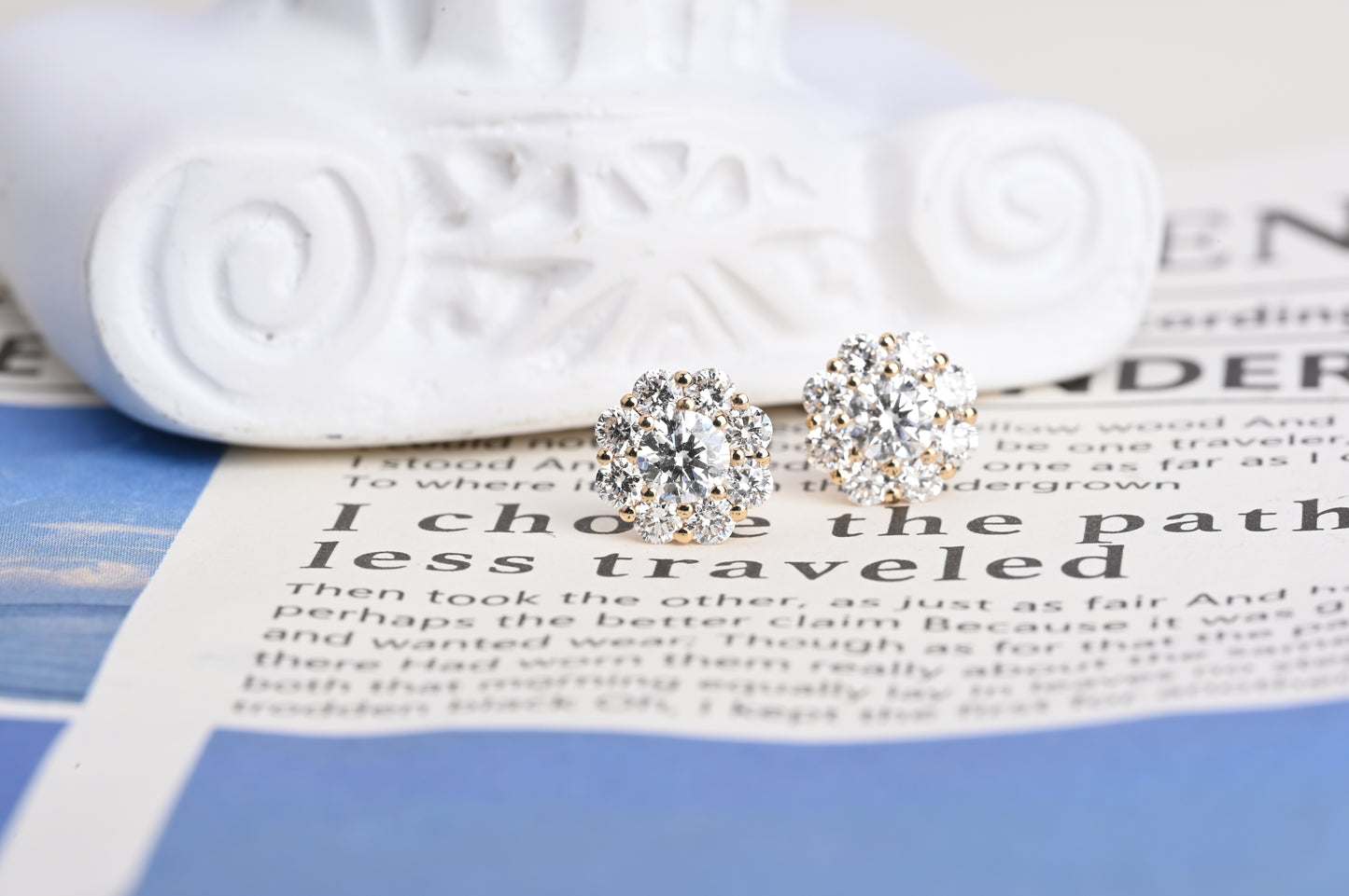 Small trumpet-shaped diamond stud earrings