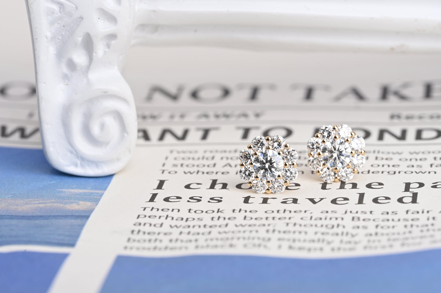 Small trumpet-shaped diamond stud earrings