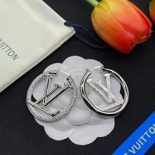 GLEAMING GOLDEN MARK STUDS