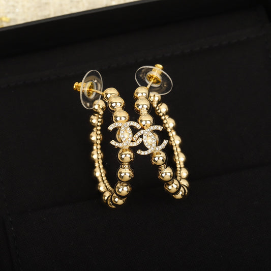 Golden bead double c pearl earrings