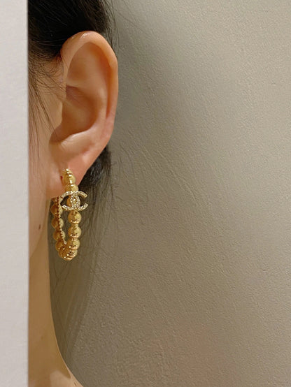 Golden bead double c pearl earrings