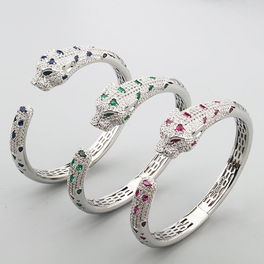 Colored diamond white gold bangle