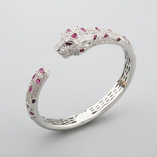 Colored diamond white gold bangle