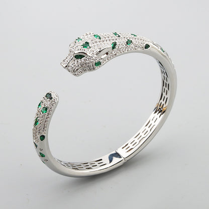 Colored diamond white gold bangle