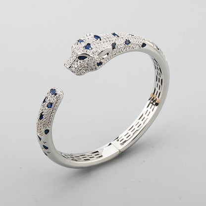 Colored diamond white gold bangle
