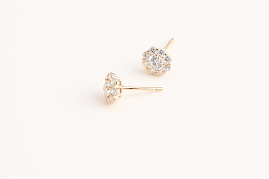 Small trumpet-shaped diamond stud earrings