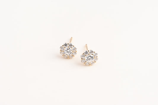 Small trumpet-shaped diamond stud earrings